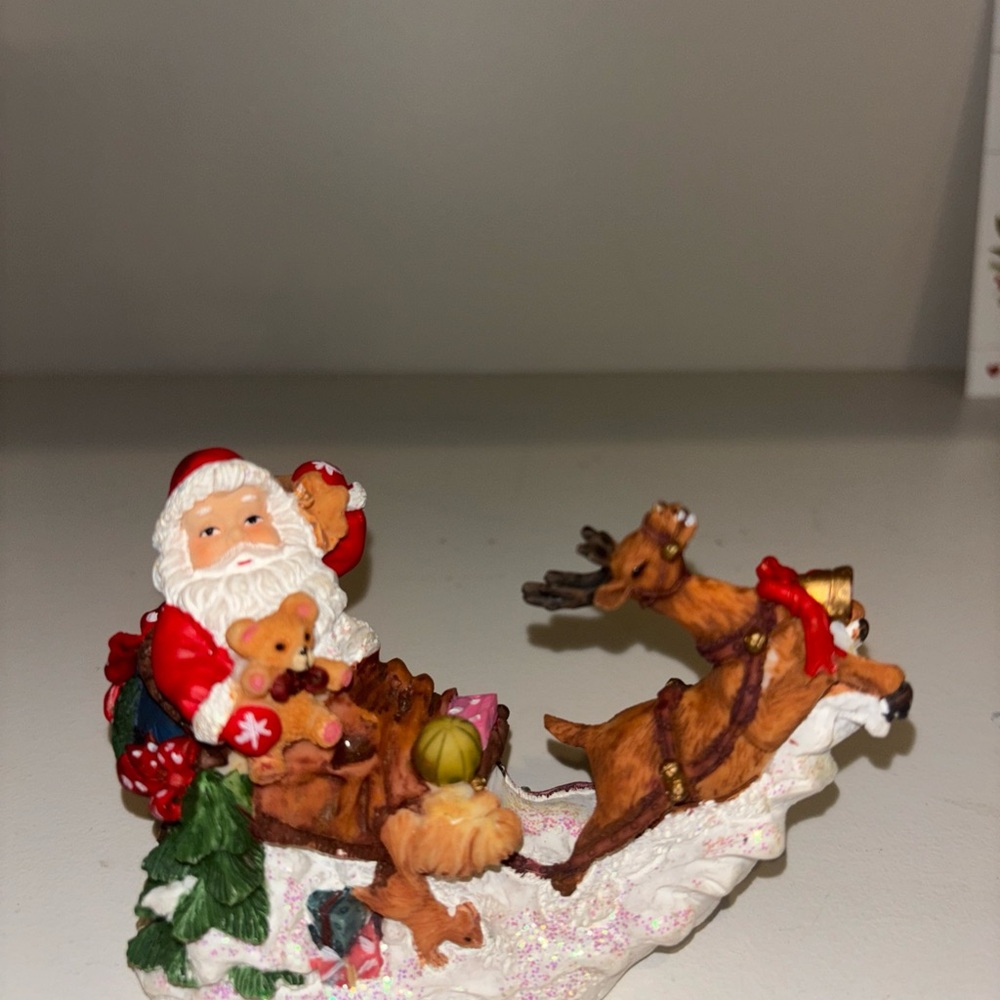 Festive Santa and Reindeer Holiday Figurine